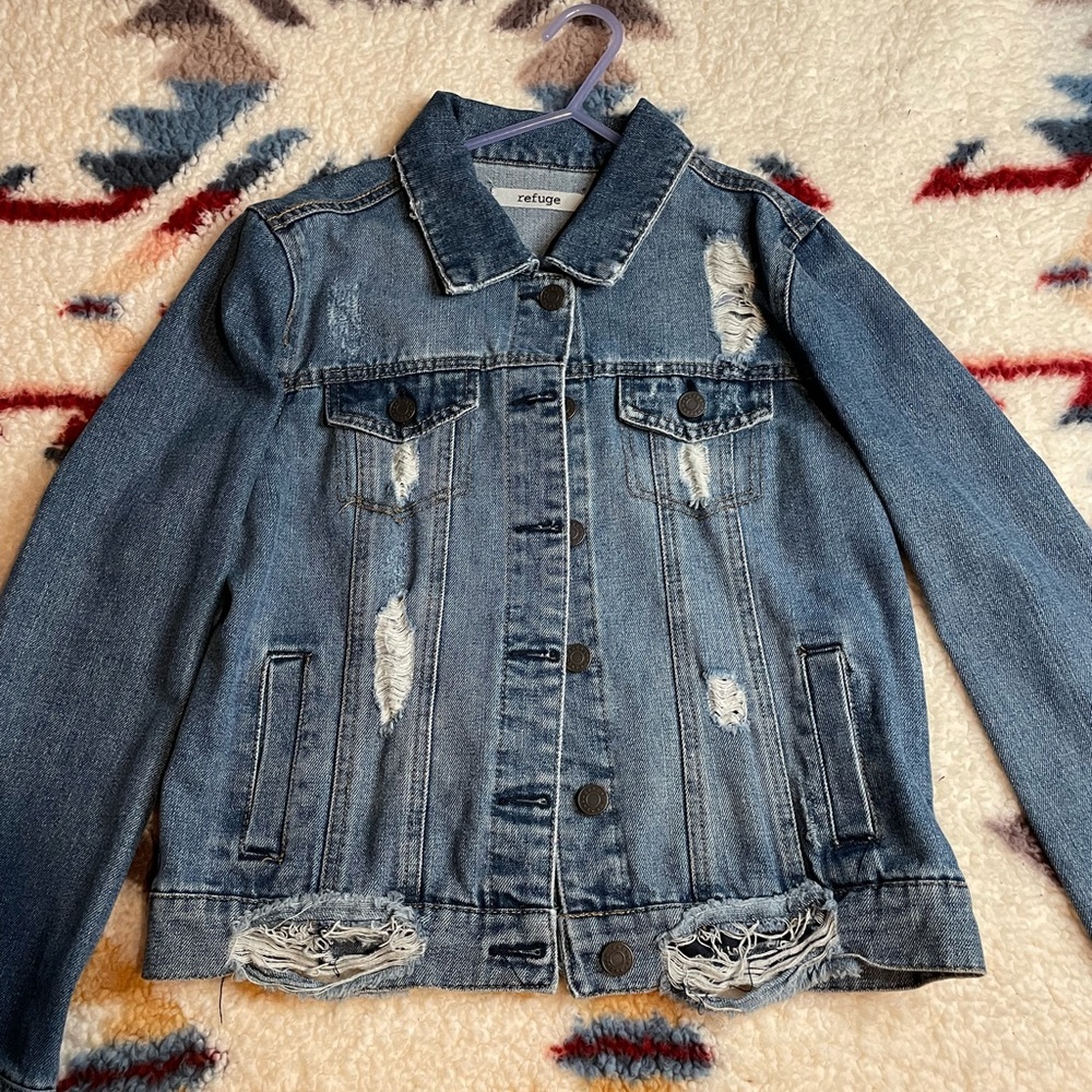 Blue Jean jacket with rips